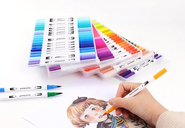 Set of watercolour pens in various colours arranged in a case, showing plastic barrels and fine tips.