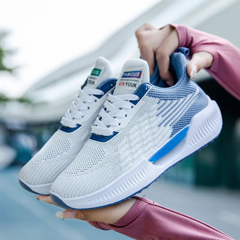 Men's blue casual mesh shoes with round toe and injection moulded sole on a white background.