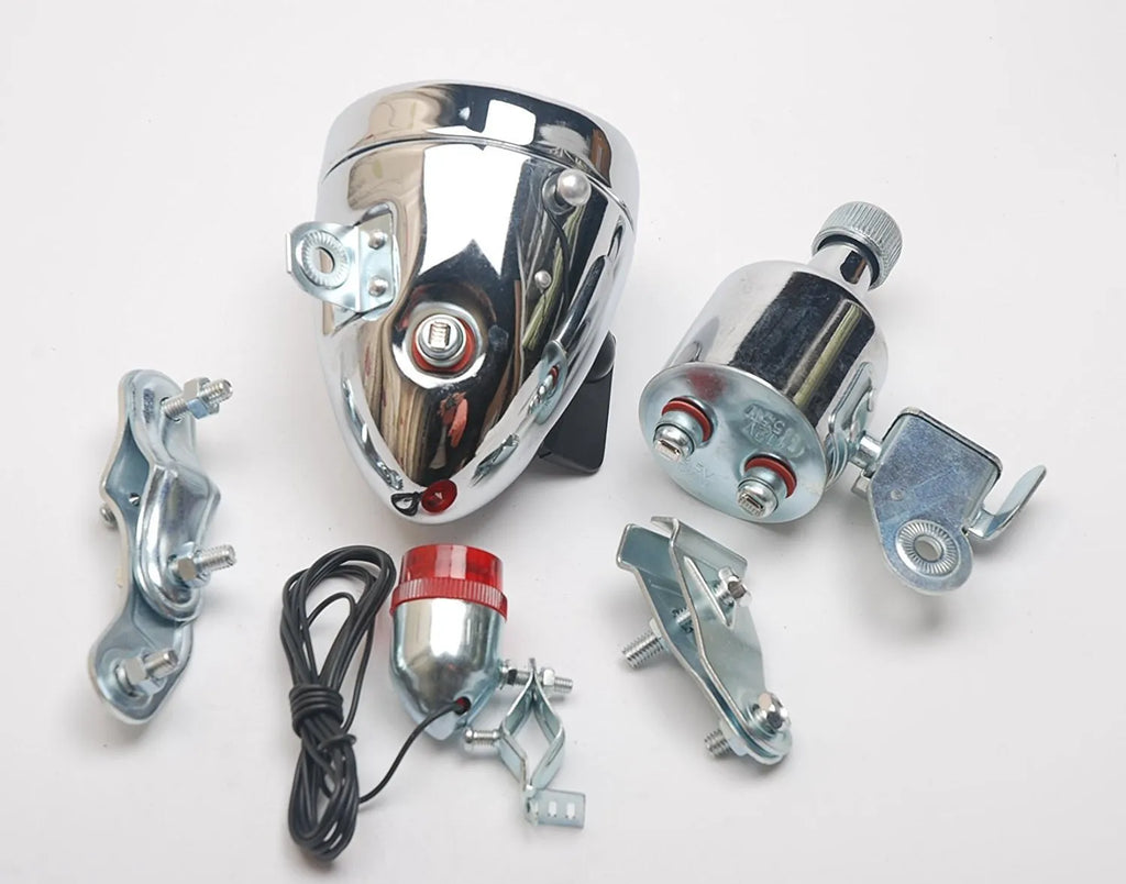 Silver bicycle dynamo light generator kit for front fork or rear frame mounting with friction power generation