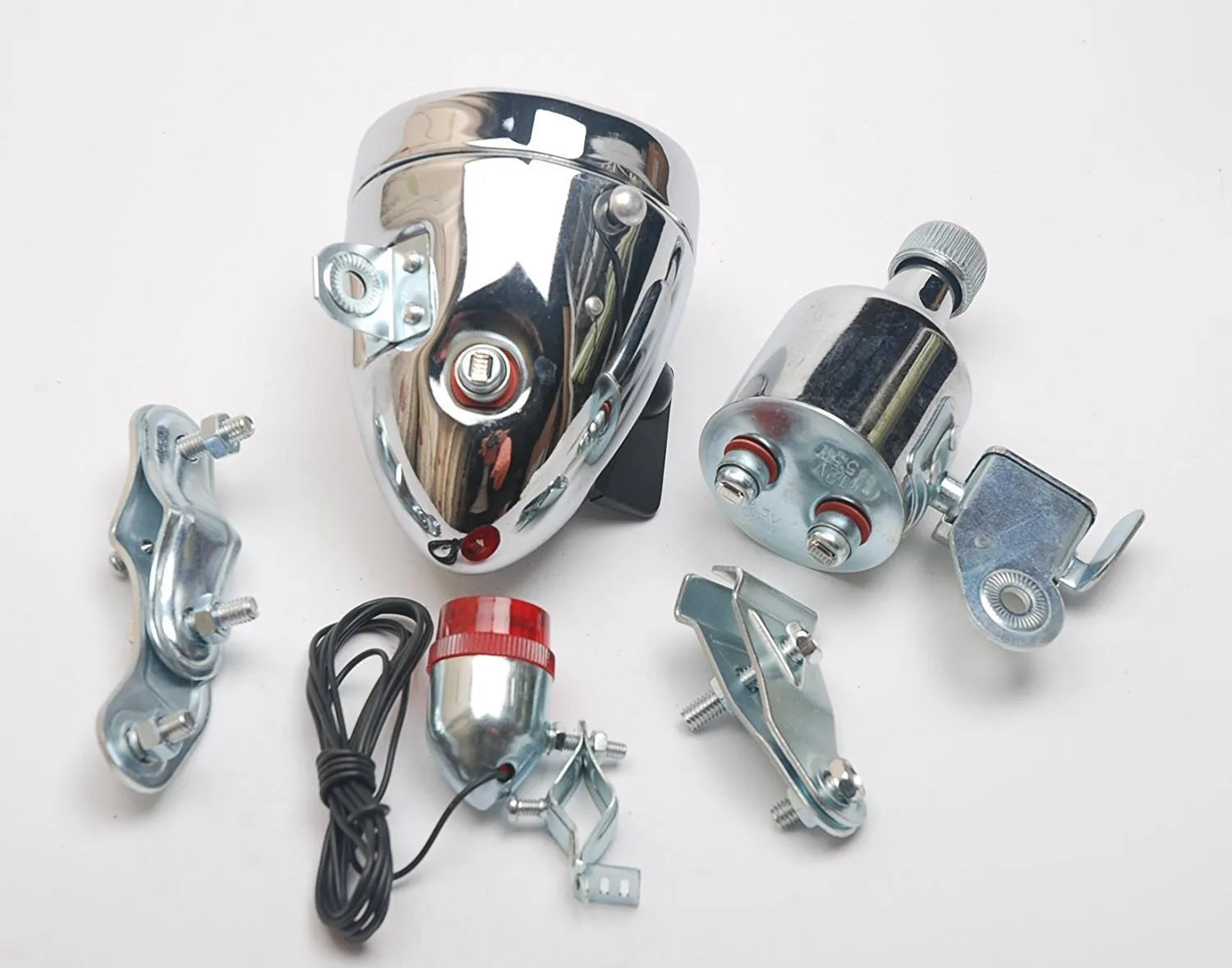 Silver bicycle dynamo light generator kit for front fork or rear frame mounting with friction power generation