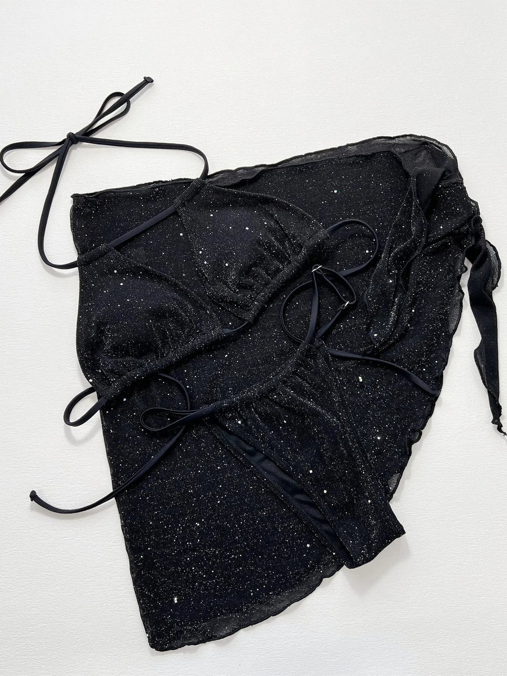 Black three-piece swimsuit bikini set with separate top and shorts