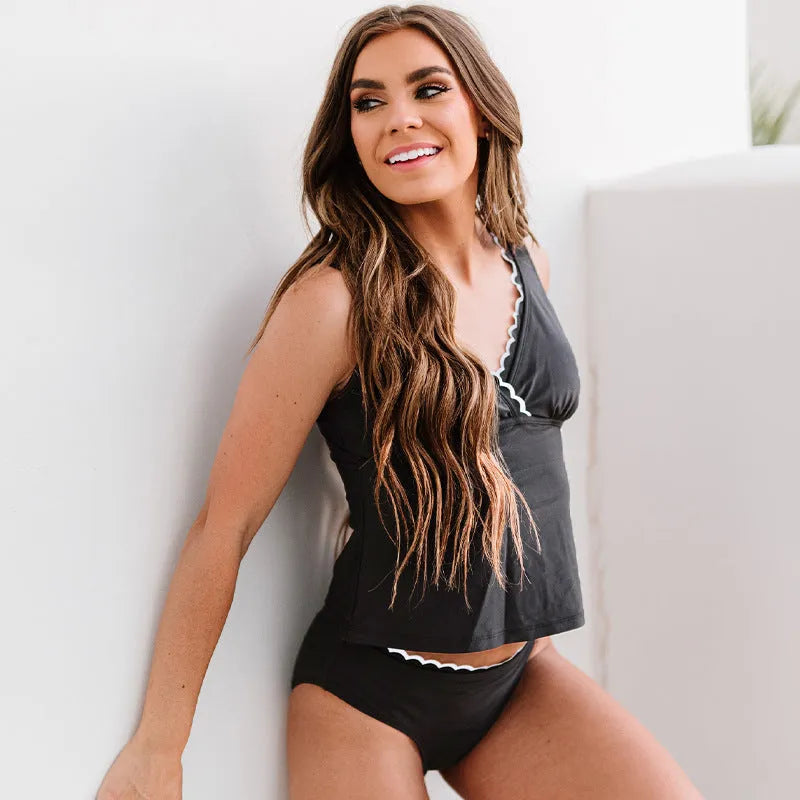 Black women's two-piece nylon bikini set on a neutral background.