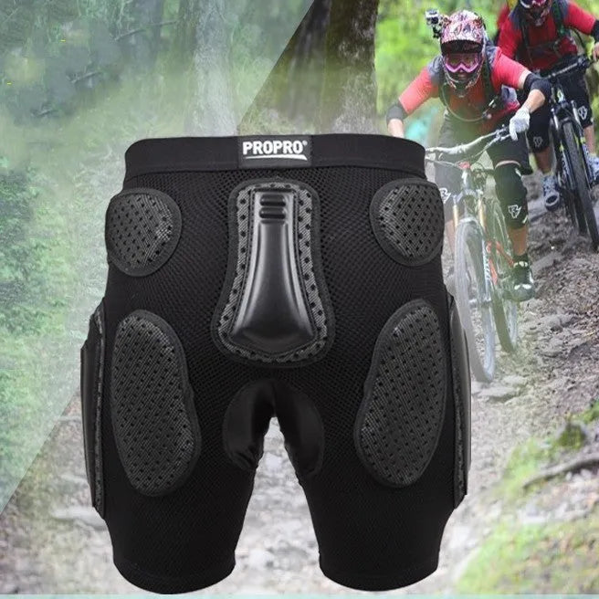 Black cycling hip protection pants showing padded construction for impact safety during mountain biking.