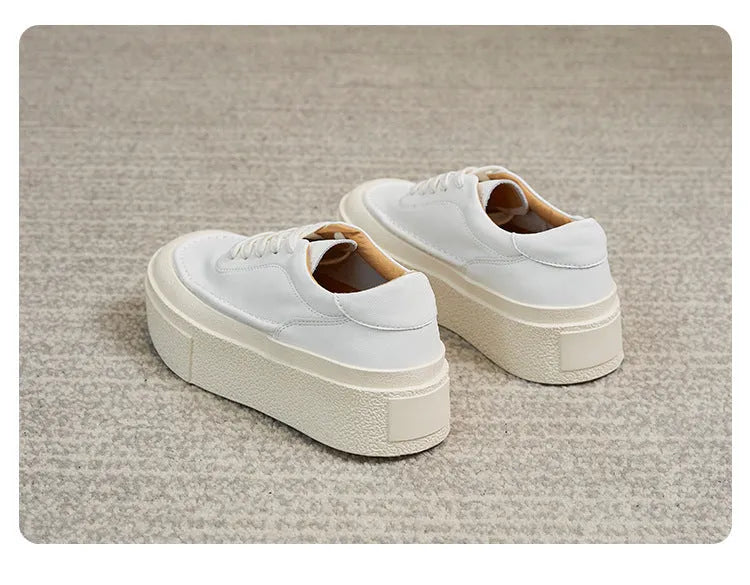 Women's black platform sports board shoes with embossed cowhide upper and tie fastening
