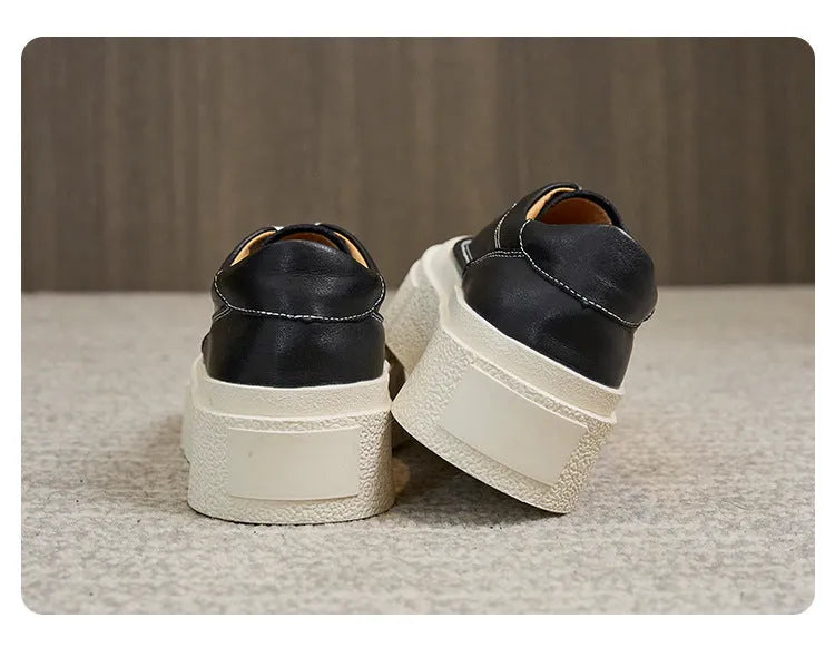 Women's black platform sports board shoes with embossed cowhide upper and tie fastening