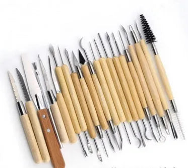 27-piece brown pottery clay tool set with wood, steel, and plastic tools in an OPP storage bag