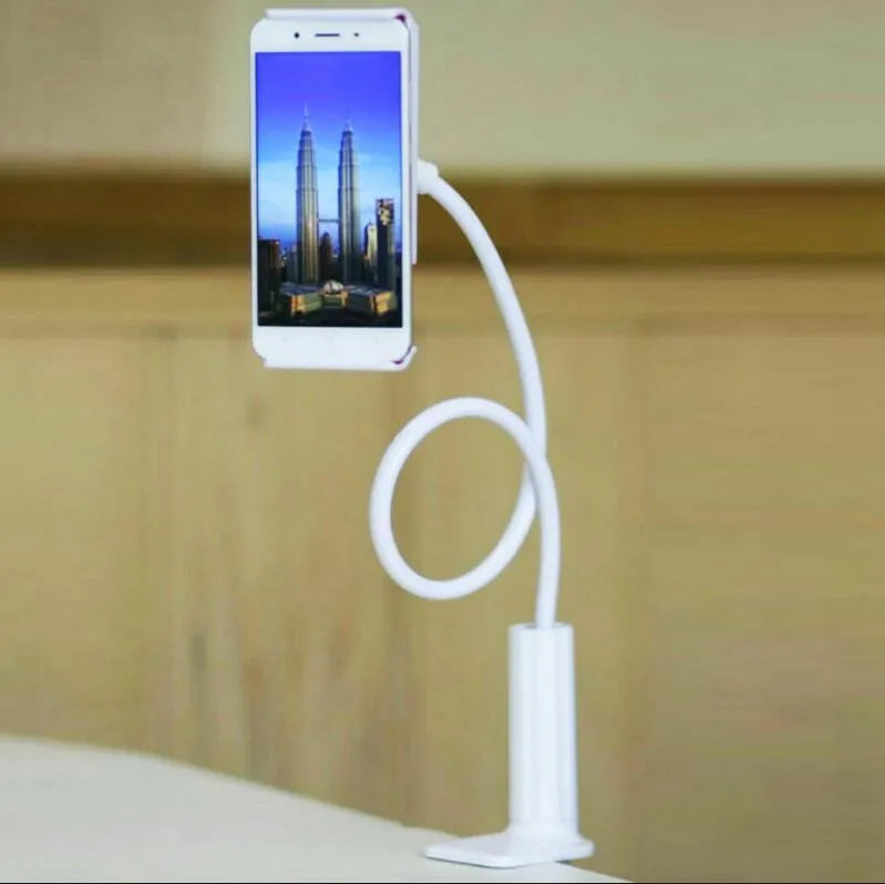 Black adjustable bedside phone holder with long arm on a table