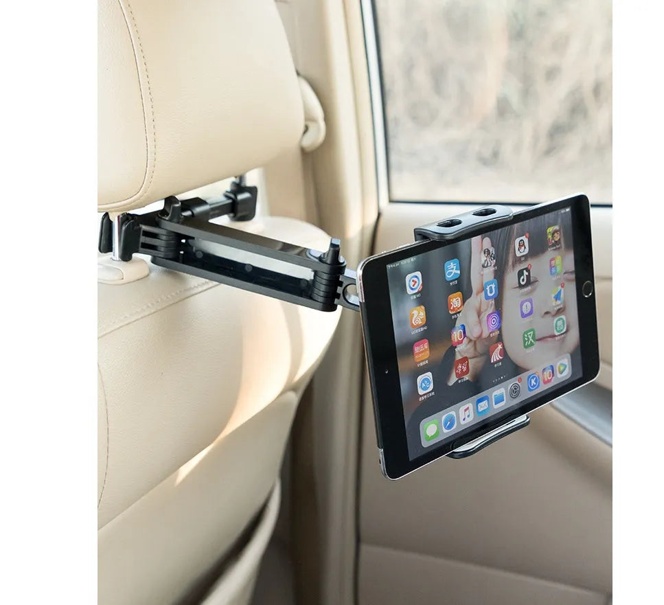Black car headrest-mounted phone and tablet holder with universal snap-in silicone cradle.