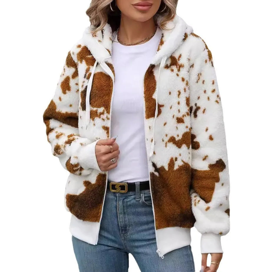 A man's yellow and brown cow print hooded cardigan jacket with a front zipper.