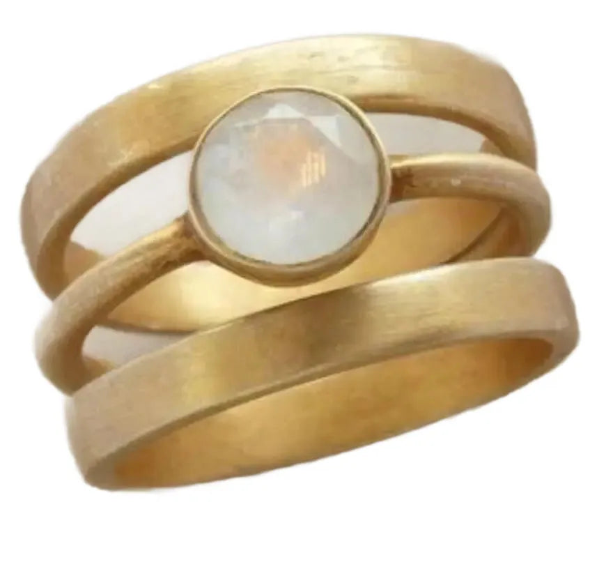 Geometric gold-plated titanium steel ring with hollow framework and micro-inlaid white chalcedony stone