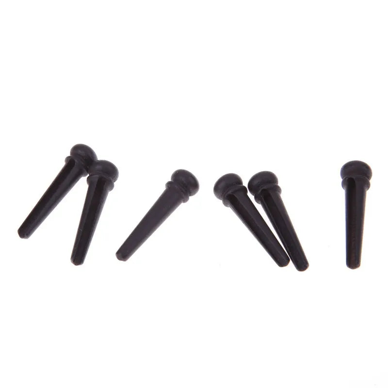 Six ebony guitar string nails with 5.3mm bayonet diameter for folk acoustic guitars