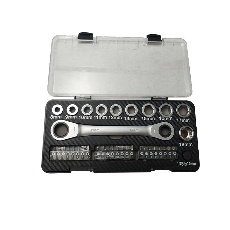 Professional ratchet wrench set with 1/4-inch drive, multiple sockets, and bit heads on a workbench.