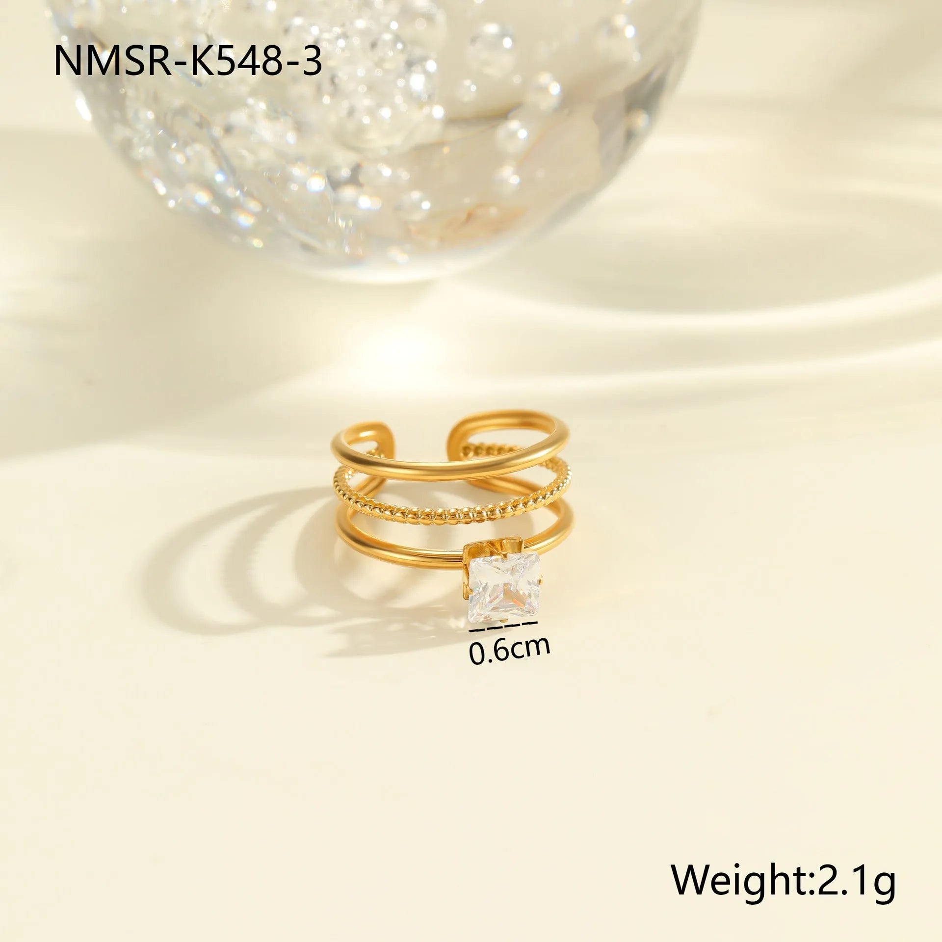 Gold electroplated stainless steel ring with zircon geometric design and open mouth adjustable fit