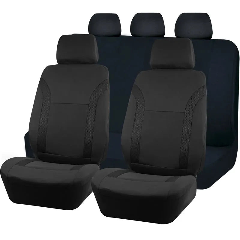 Blue polyester car seat cover with eyelet stitching on a vehicle front seat.