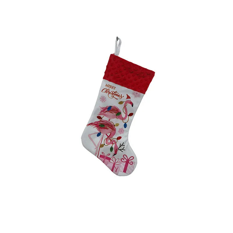 Flamingo Christmas stocking holiday decoration in cloth material measuring 46cm by 28cm