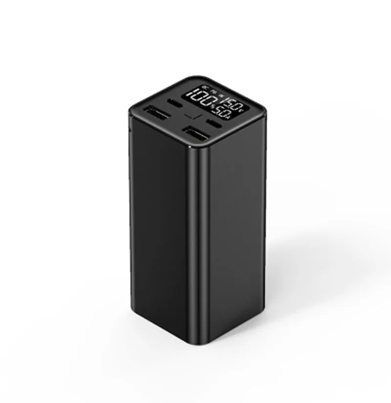 Black high power 65W metal laptop charging bank showing size and ports.