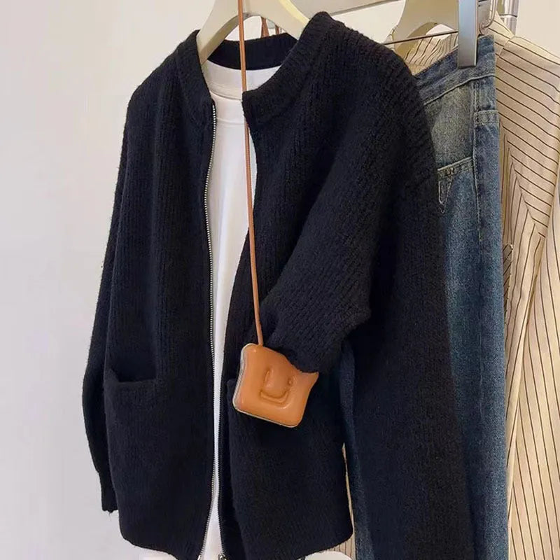 Beige soft glutinous sweater coat cardigan with long sleeves on hanger