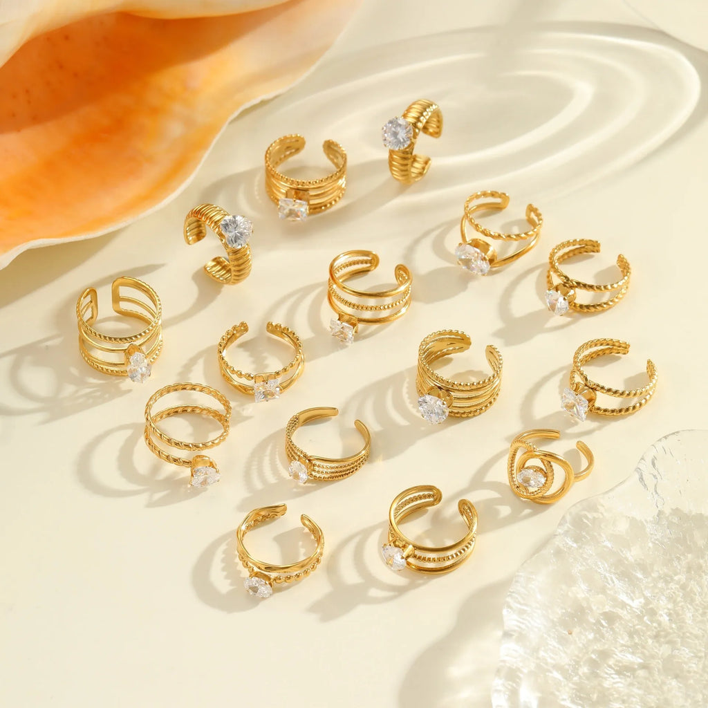 Gold electroplated stainless steel ring with zircon geometric design and open mouth adjustable fit