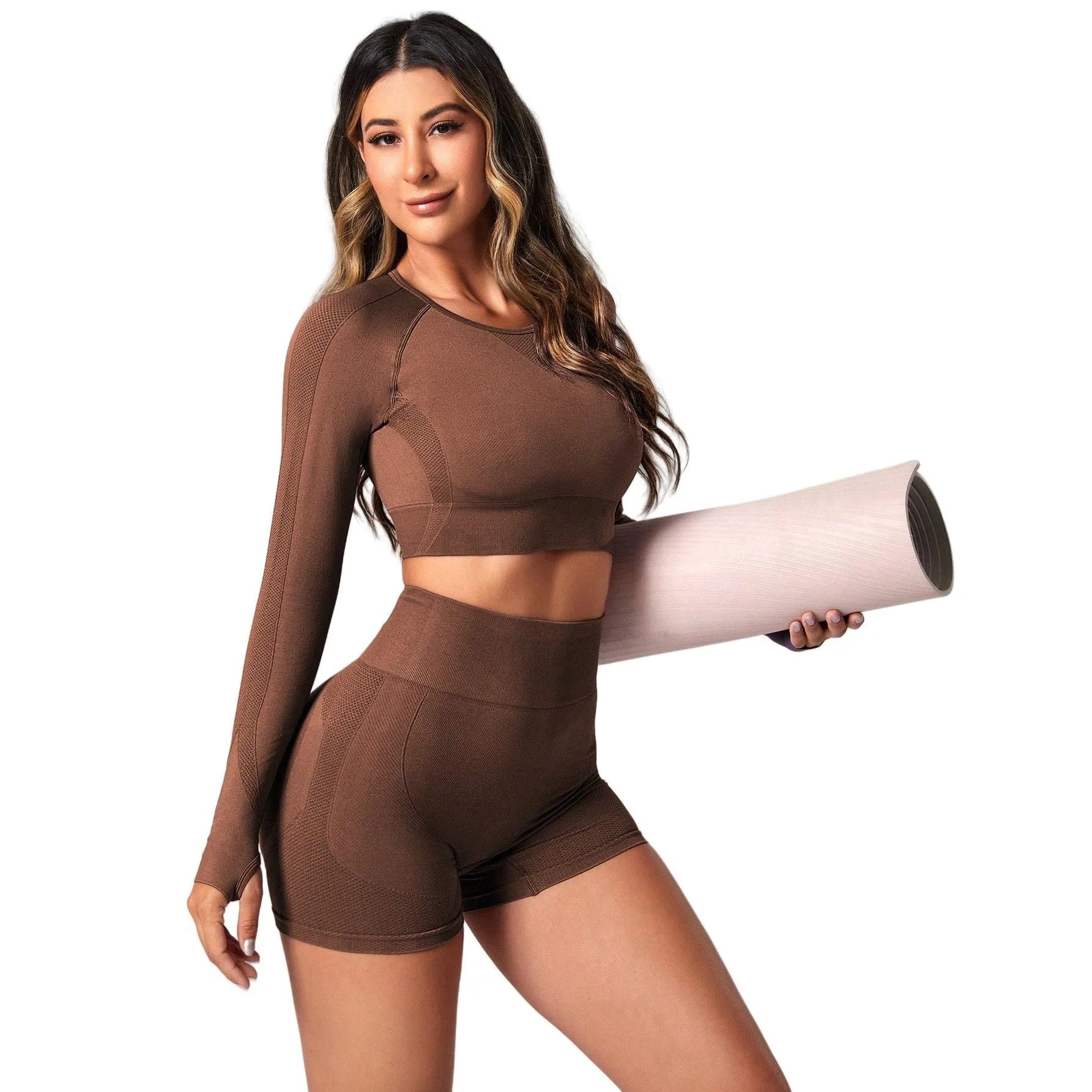 Women's black high waist yoga suit with long sleeve top and tight-fitting trousers on a mannequin.