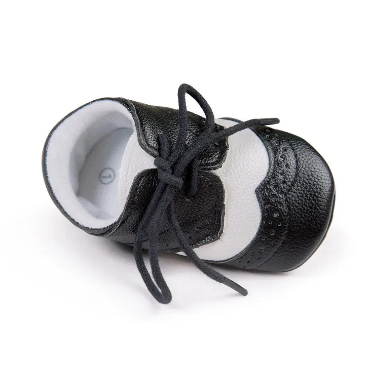 Men's vintage style soft-soled baby walking shoes in synthetic leather, showing colour options and sizing for 0-12 month infants