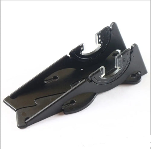 Plastic card type mobile phone holder in multiple colours on a desktop