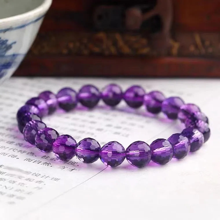 128-cut crystal bracelet showing detailed facet reflection on Amethyst, Ametrine or Citrine beads