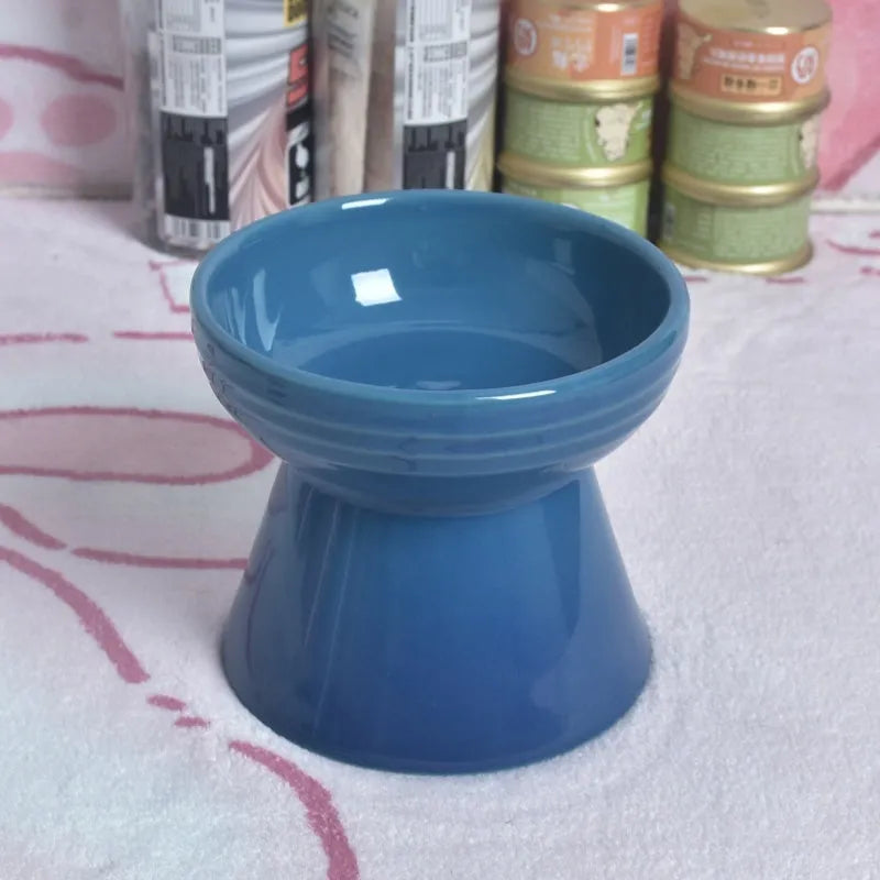 Ceramic pet bowl with anti-tumble design and raised chin support for cats and dogs