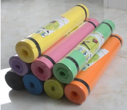 Super soft EVA yoga mat in blue showing texture and thickness