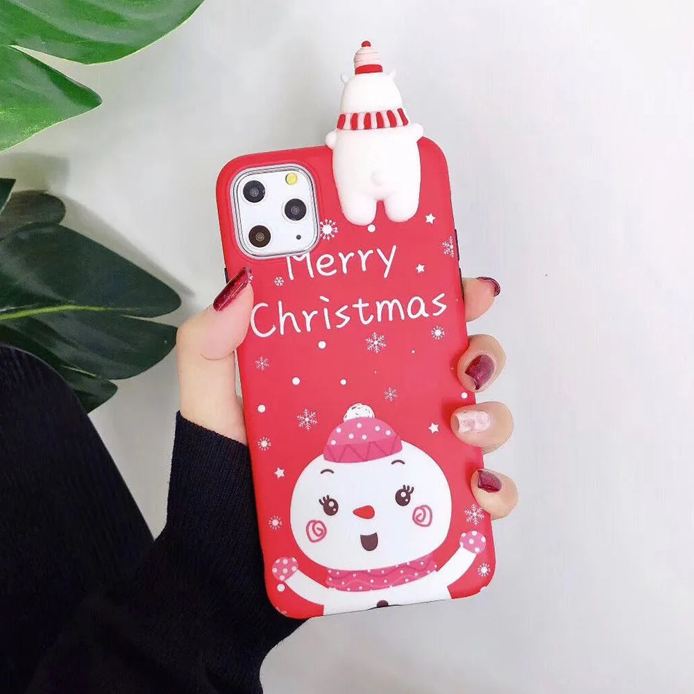 Red Christmas-themed silicone phone case on an iPhone, showing festive back cover design.