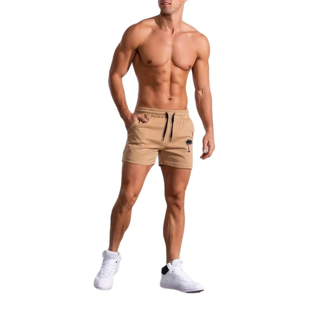 Men's khaki sports shorts with coconut print pattern showing straight cut and micro-elastic polyester fabric