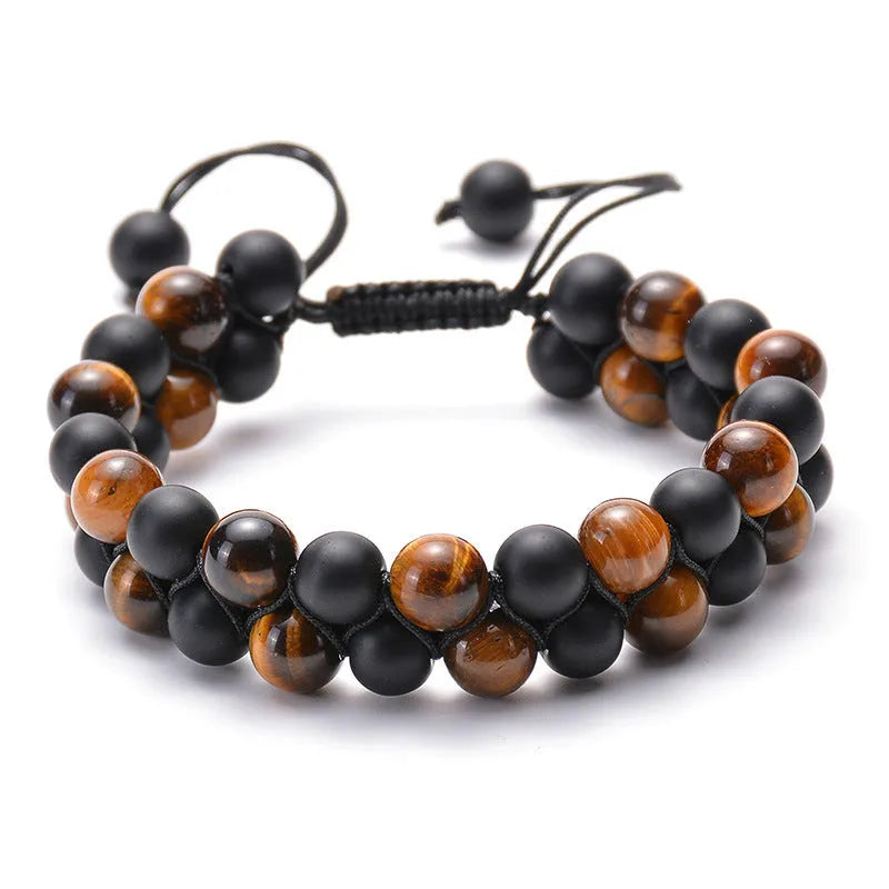 Geometric couple bracelet made of matte black agate beads with a tiger eye stone.