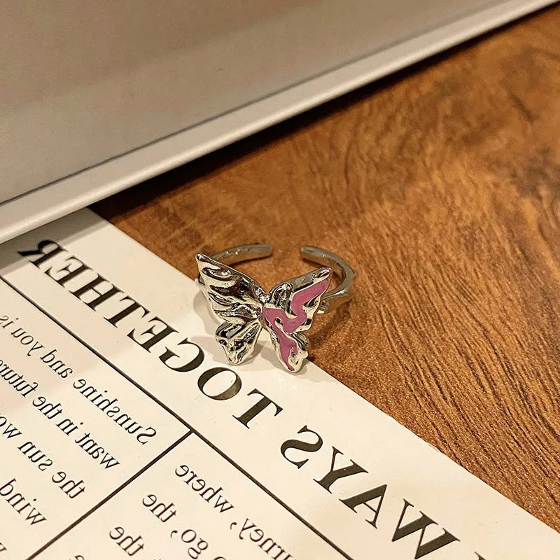 Copper women's ring featuring a creative Chinese butterfly design, available in multiple colours.