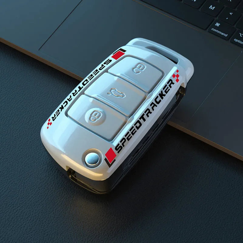 Carbon fibre style car key cover with mirrored finish in white and carbon colour options