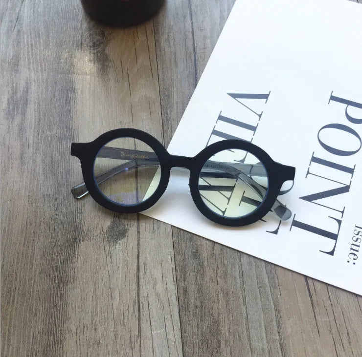 Retro round plastic frame glasses with anti-blue light filter in black, pink, leopard, red, white, or yellow.