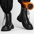 Men's black mid-top leather-style boots with rubber sole showing waterproof non-slip design