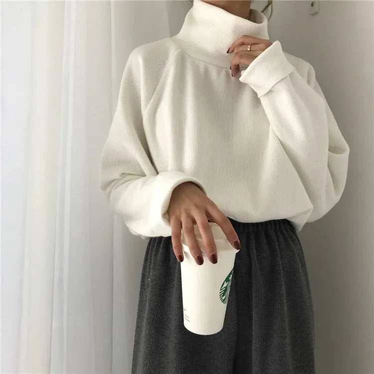Women's loose fit long sleeve top with half-high collar in solid colour