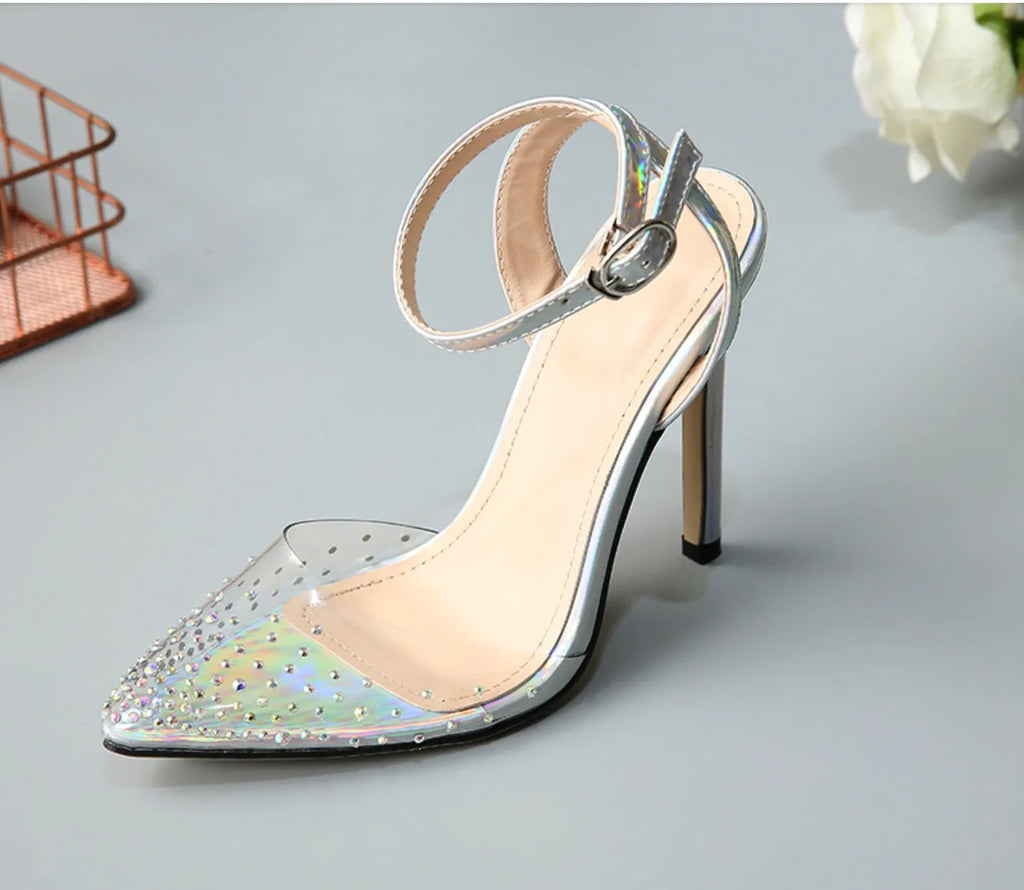 Women's pointed toe diamond sandals with a clear stiletto heel on a white background.