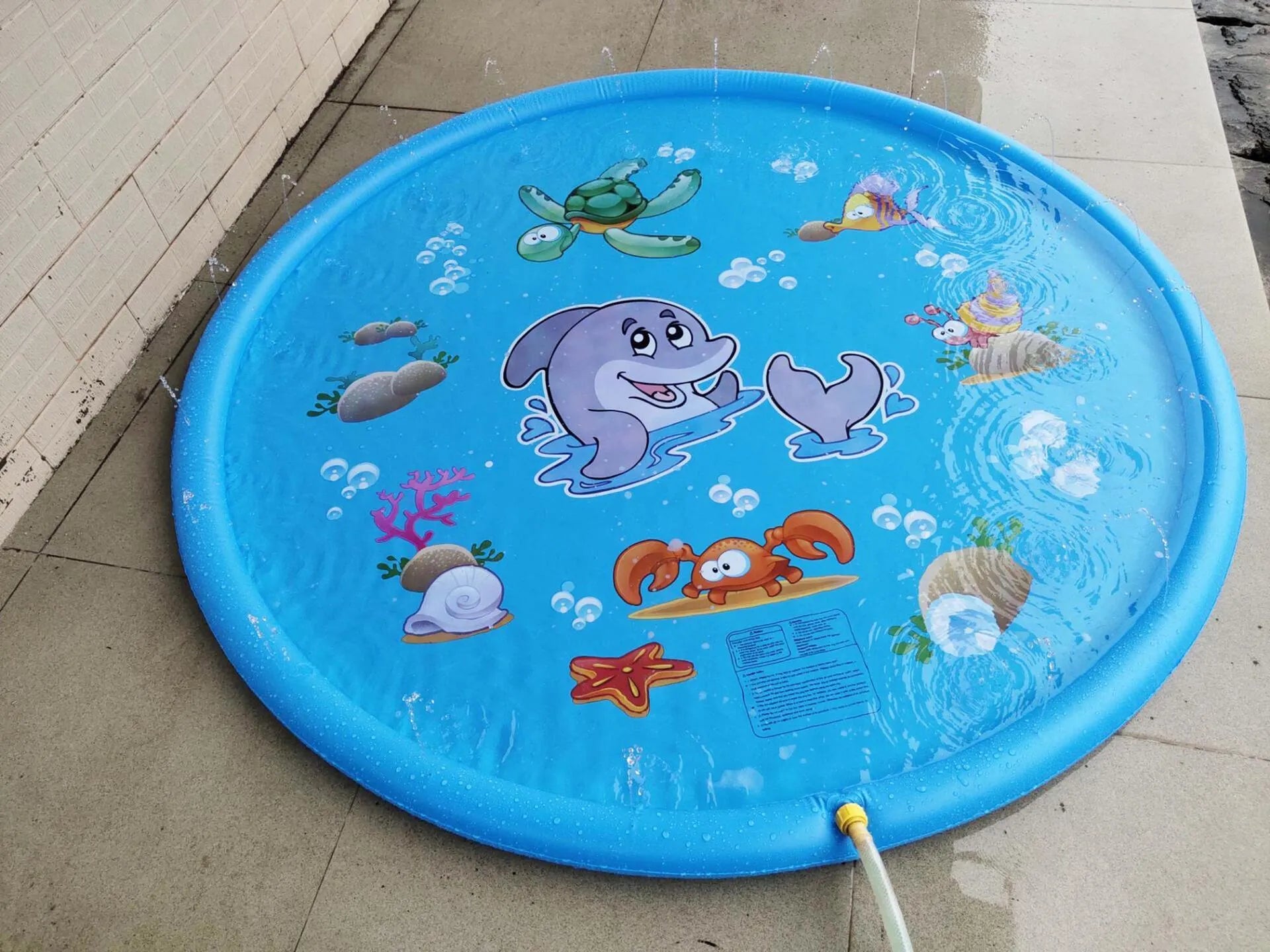 Blue PVC children's water spray play mat with marine animals, measuring 100cm by 170cm