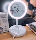 White foldable LED vanity mirror with beauty fill light showing double-sided design and USB charging port