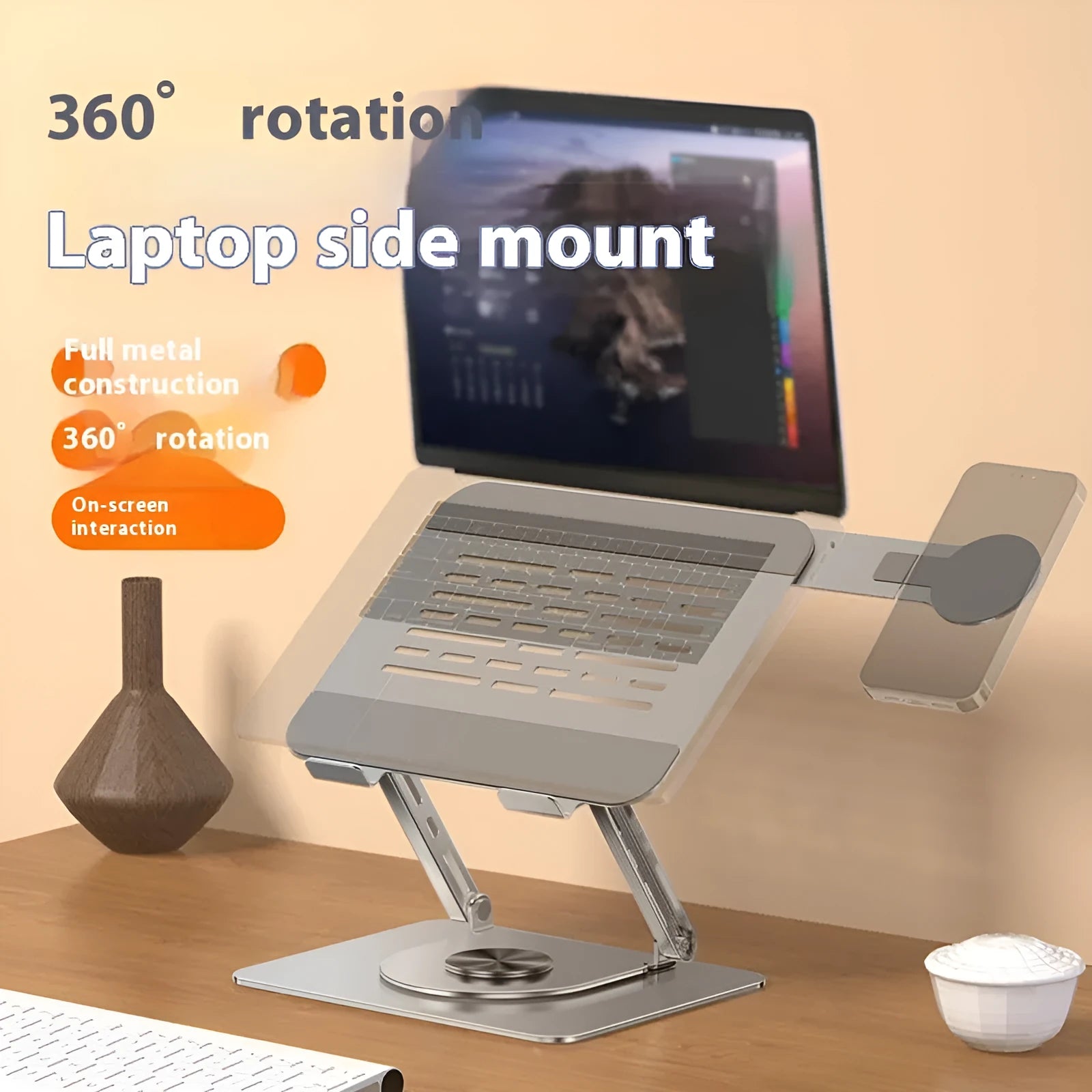 Silver carbon steel laptop stand with a rotating magnetic mobile phone holder attached.