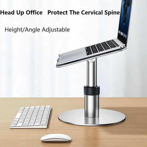 Silver adjustable car laptop stand with height settings and rotating base on a car seat.