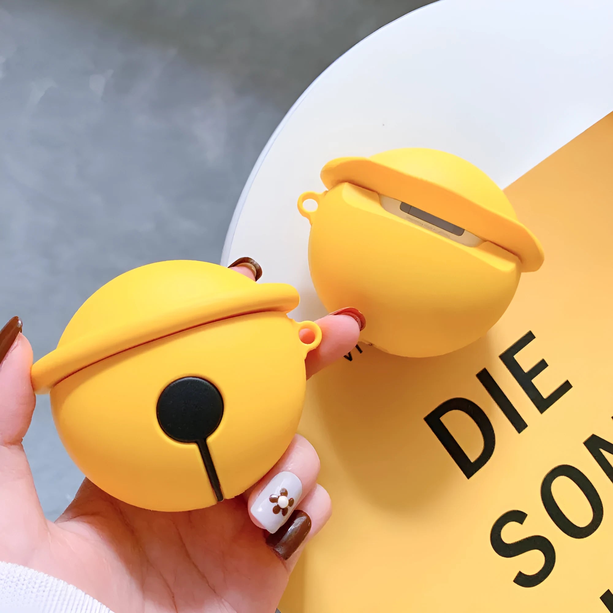 Bright yellow silicone case with bell charm for AirPods 1st and 2nd generation