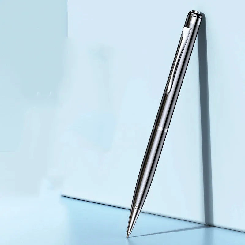 Black pen shaped audio recorder with zinc alloy shell shown next to included headset and USB data cable.