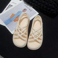 Women's floral decorated PVC sandals in beige or black with non-slip soles