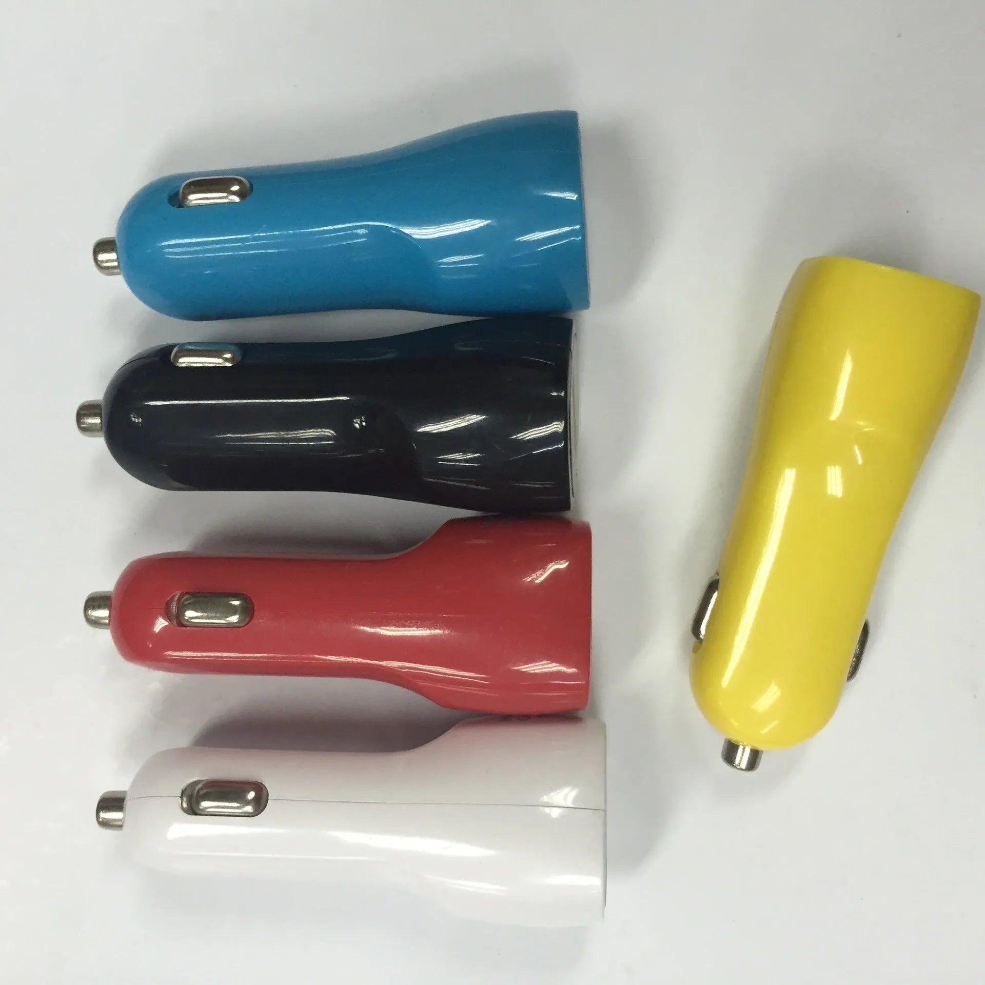 Duckbill-shaped dual USB car charger with blue LED indicator light