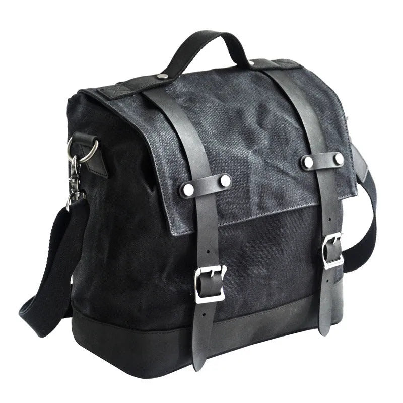 Thick waterproof canvas motorcycle side bag showing dimensions and black colour option