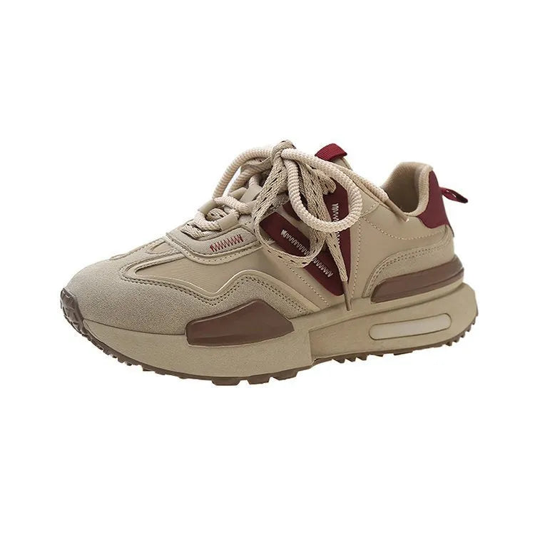 Women's black retro platform sports shoes with round toe and lace-up design on a white background.