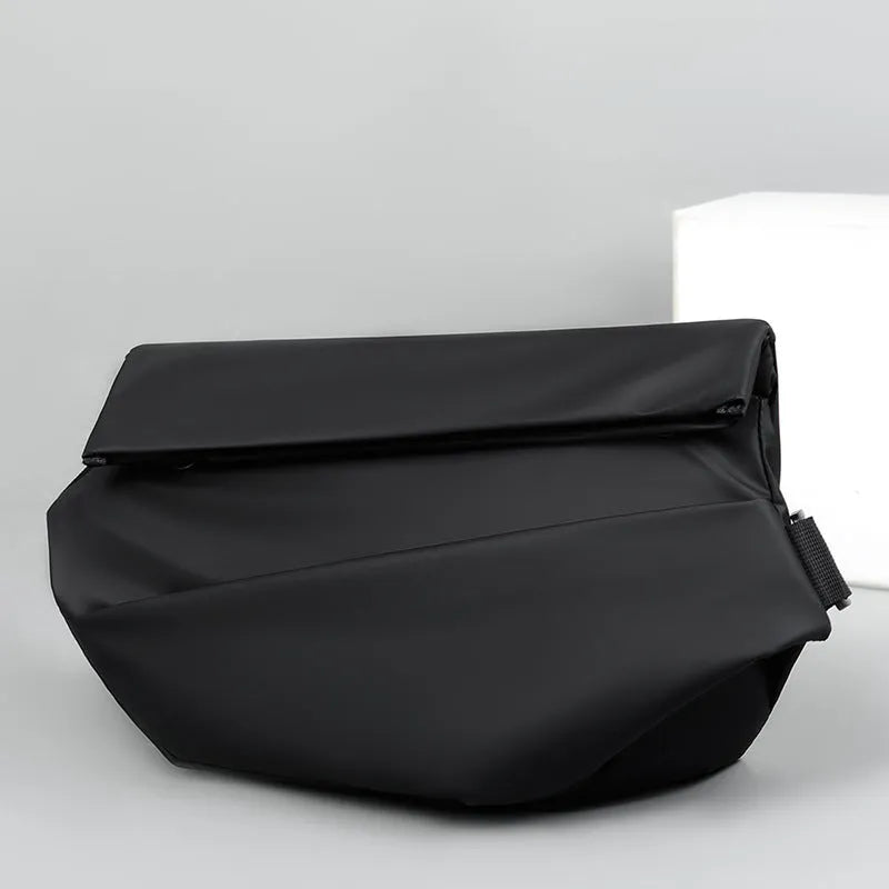Grey medium square crossbody bag for men showing internal phone and document compartments
