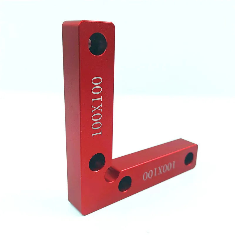Aluminium woodworking right angle positioning block with scale markings for jigsaw fixtures