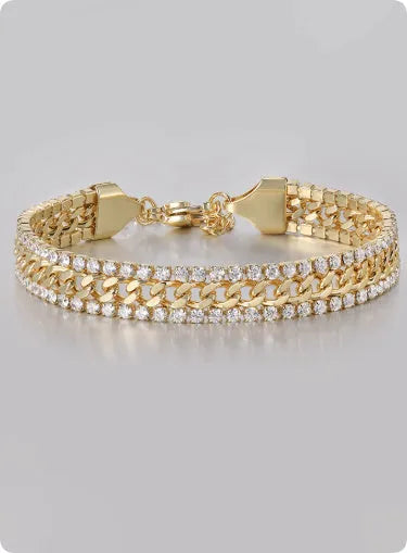 Gold-coloured tennis bracelet with gemstone detail on a titanium steel band.